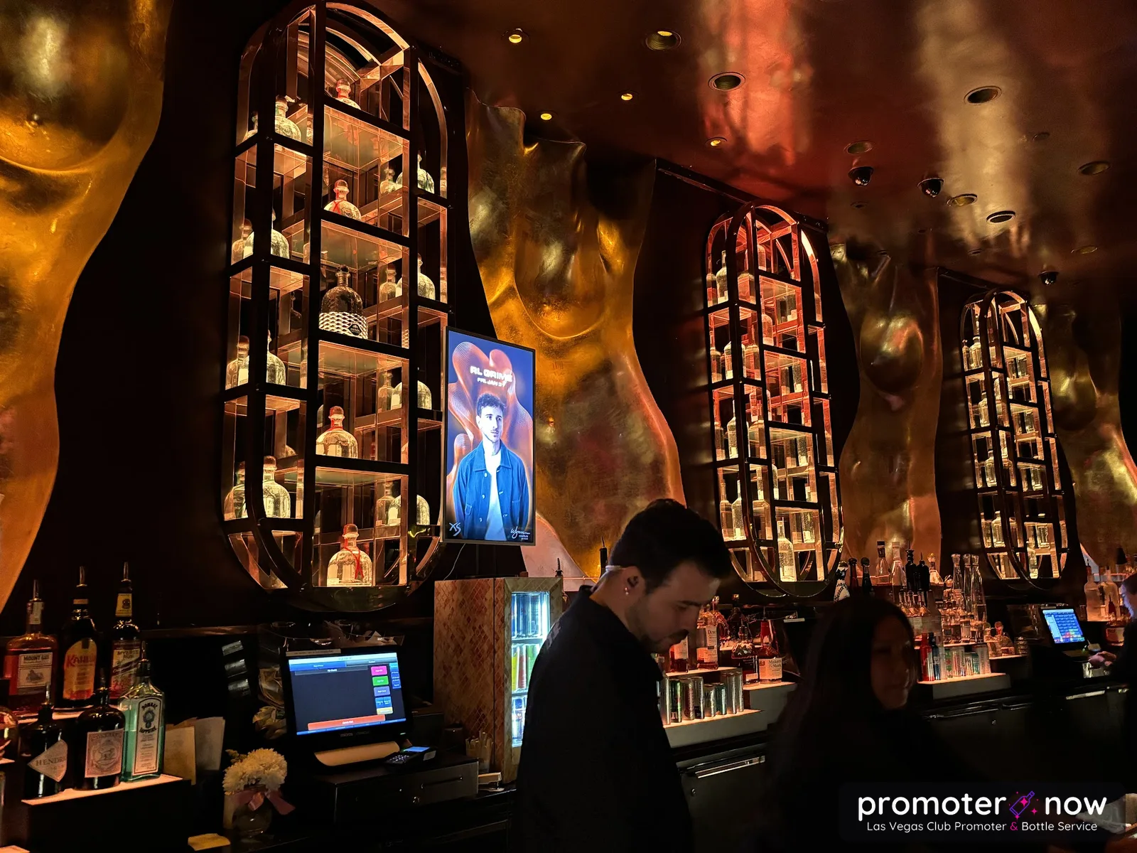 The sculpture-backed main bar inside XS Nightclub Las Vegas