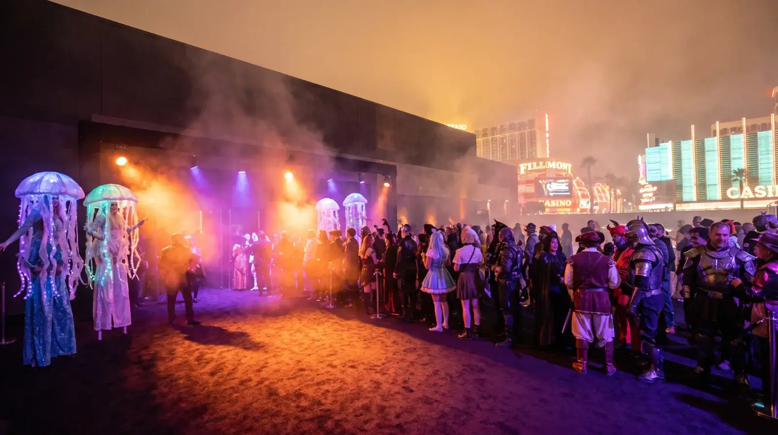 Costumed crowd at a Las Vegas nightclub entrance on Halloween