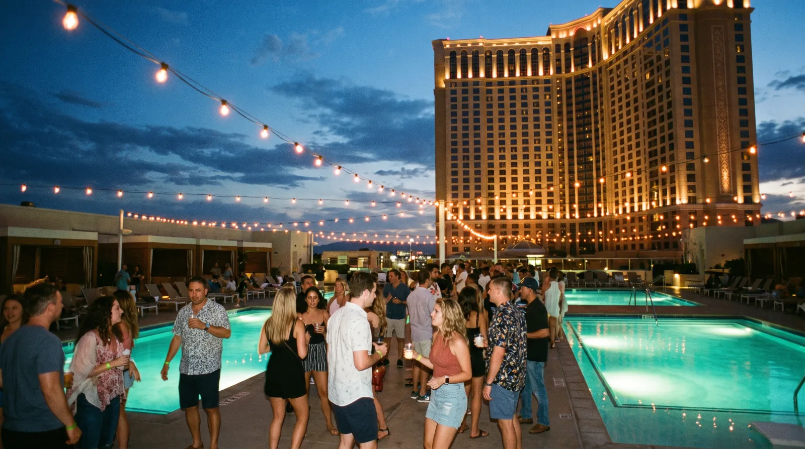 Las Vegas pool party continuing after dark on Labor Day Weekend